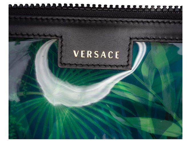 Clutch con zip Versace in PVC verde con stampa jungle - vista 5