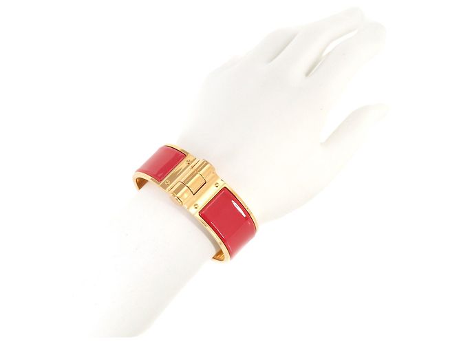 Bracciale Charm Hermès in Oro e Rouge Vif Rosso D'oro - vista 6
