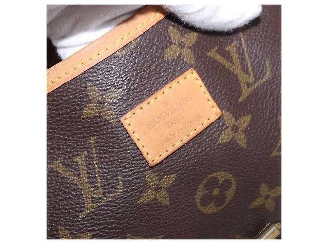 Louis Vuitton Saumur Monogram 35 Marrone - vista 6