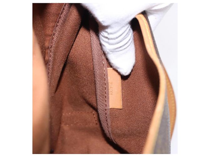 Louis Vuitton Saumur Monogram 35 Marrone - vista 7