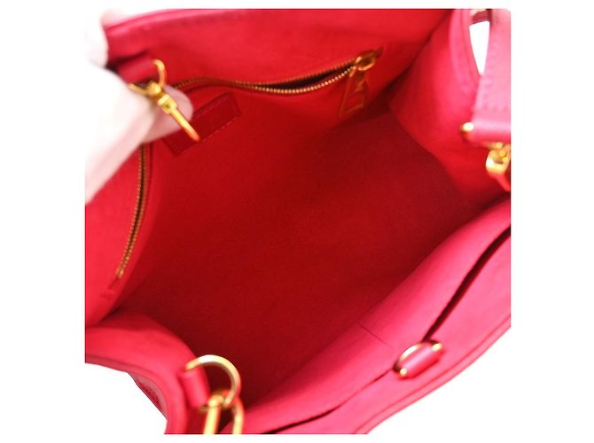 Louis Vuitton OnTheGo Monogram Empreinte PM Rosa - vista 3