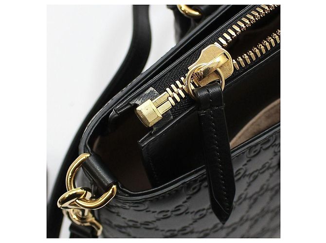 Gucci Borsa a tracolla nera con logo GG in tonalità oro Nero - vista 10