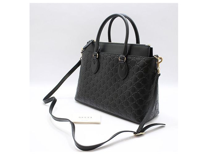 Gucci Borsa a tracolla nera con logo GG in tonalità oro Nero - vista 2