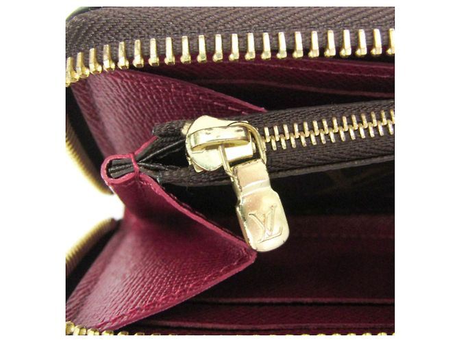 Portafoglio Louis Vuitton Monogram Clemence Marrone Fuschia - vista 10