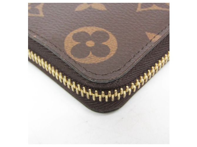 Portafoglio Louis Vuitton Monogram Clemence Marrone Fuschia - vista 7