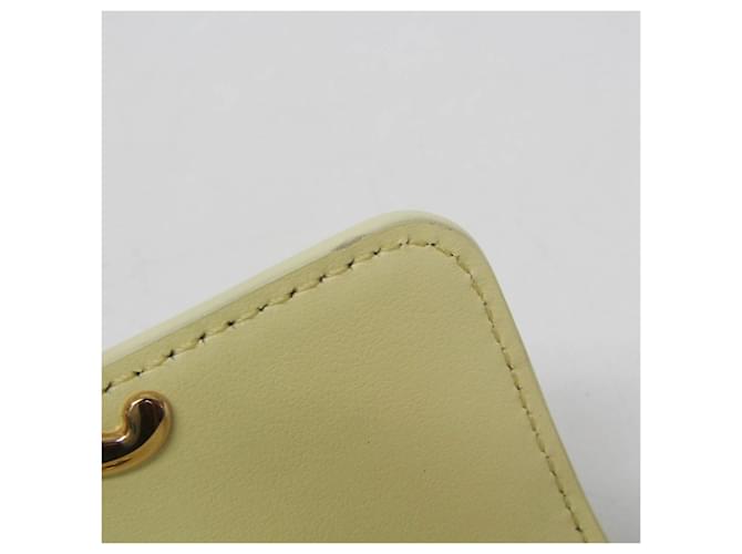 Céline Cartera compacta Triomphe Celine en amarillo - vista 13