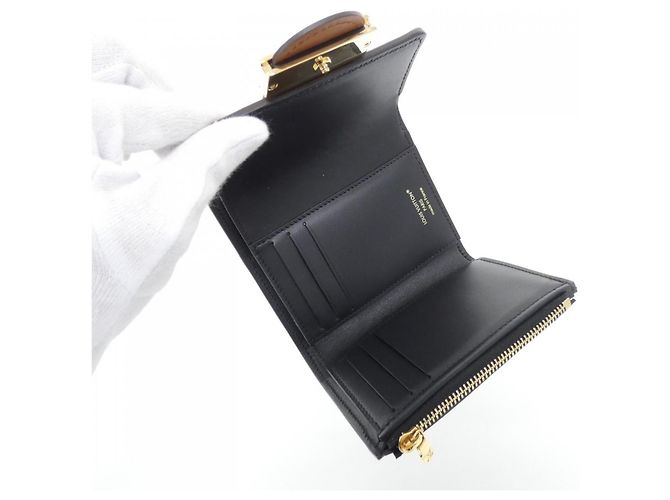 Louis Vuitton Monogram Portefeuille Dauphine Compact Wallet Castaño - vista 4