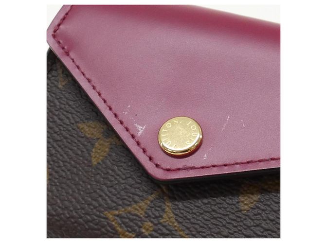 Louis Vuitton Monogram Portefeuille Zoe M62932 Cartera Castaño Fucsia - vista 4