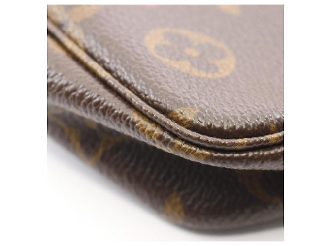 Borsa Louis Vuitton Pochette Accessoires Marrone Rosso Monogramma - vista 8