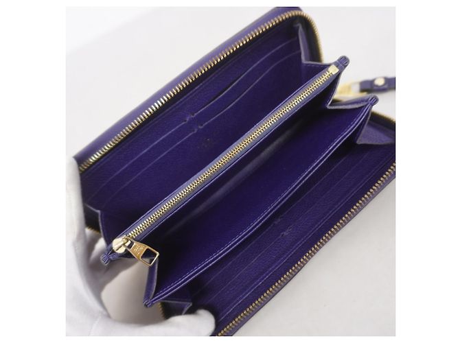 Portefeuille Zippy Monogram Empreinte Louis Vuitton Violet - vue 3