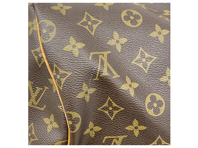 Louis Vuitton Marrone Boston Monogram Keepall 55 - vista 10