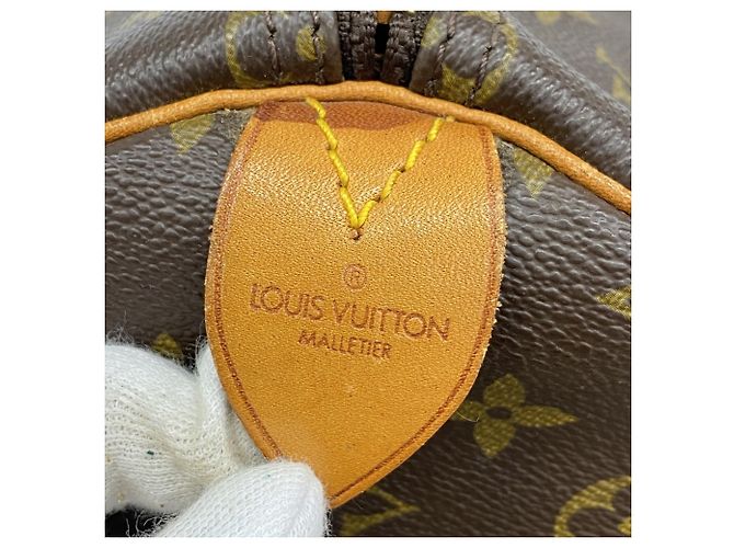 Louis Vuitton Marrone Boston Monogram Keepall 55 - vista 5