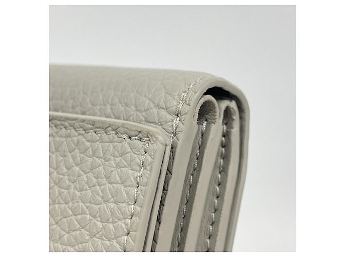 Cartera Louis Vuitton Portefeuille Capucines Tiny Tri-fold Castaño - vista 5