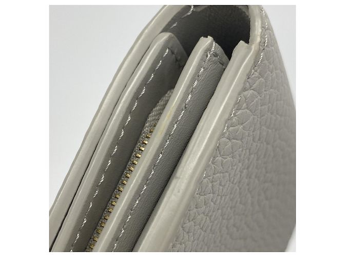 Cartera Louis Vuitton Portefeuille Capucines Tiny Tri-fold Castaño - vista 6