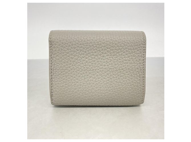 Cartera Louis Vuitton Portefeuille Capucines Tiny Tri-fold Castaño - vista 8