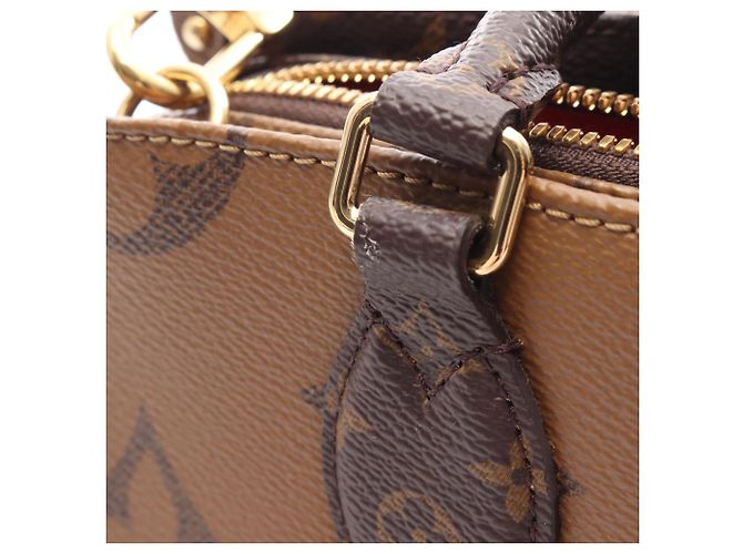 Louis Vuitton OnTheGo EW Monogram Giant Reverse 2-Way Handtasche Braun - Ansicht 6
