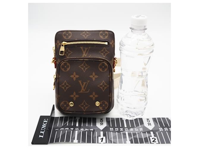 Borsa a tracolla e a spalla Louis Vuitton Monogram Utility Marrone Beige - vista 3