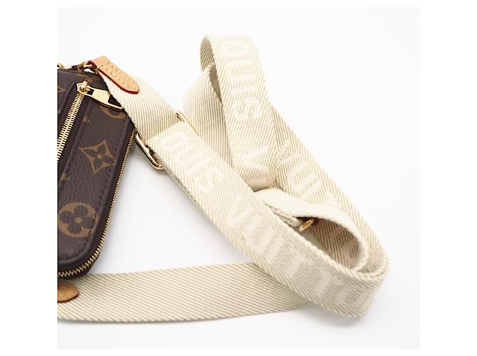 Borsa a tracolla e a spalla Louis Vuitton Monogram Utility Marrone Beige - vista 5