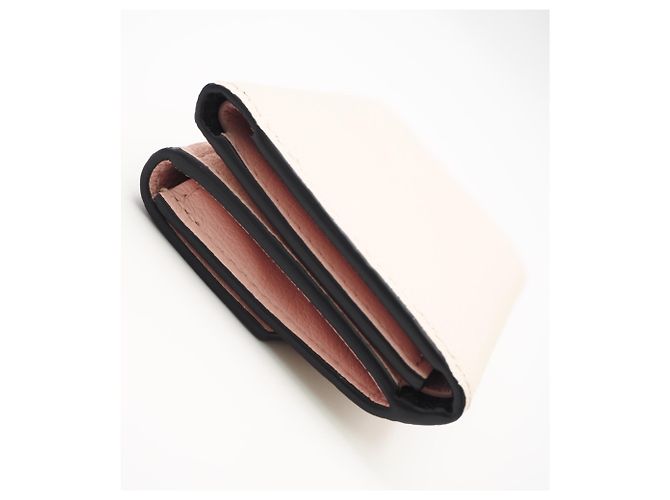 Cartera tríptico Portefeuille Lock Mini en piel de becerro granulado Louis Vuitton Negro Rosa Beige - vista 9