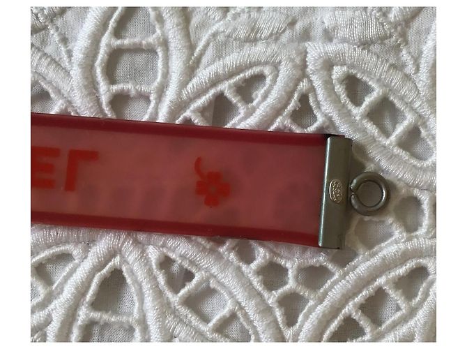 Bracciale Chanel in resina rosa traslucida con logo arancione e fiori Metallico - vista 5