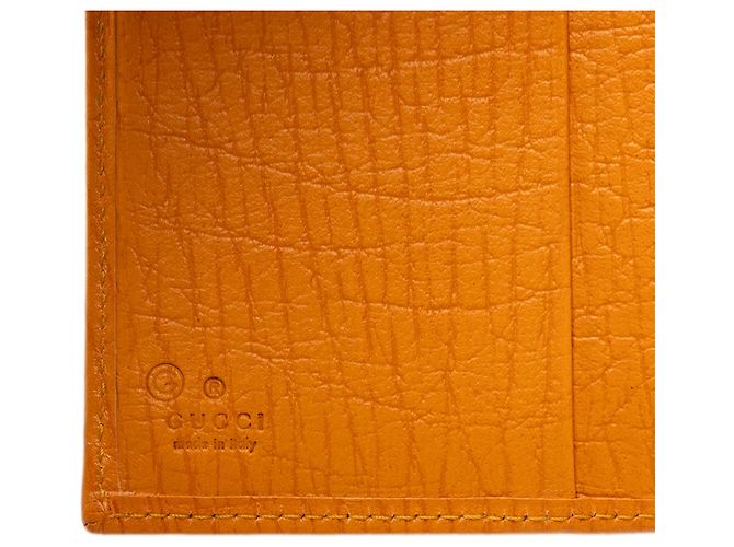 Cartera bifold de piel de becerro texturizada naranja Gucci - vista 6
