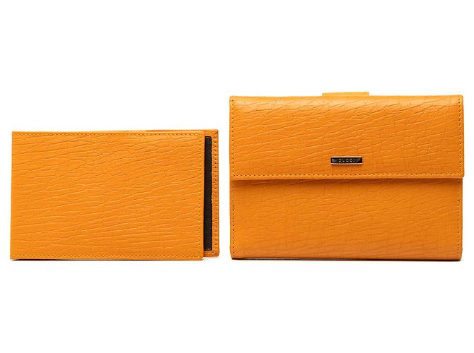 Cartera bifold de piel de becerro texturizada naranja Gucci - vista 9