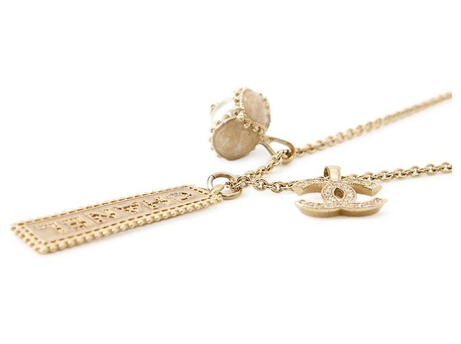 Collar Chanel con el logo Coco Dorado - vista 2