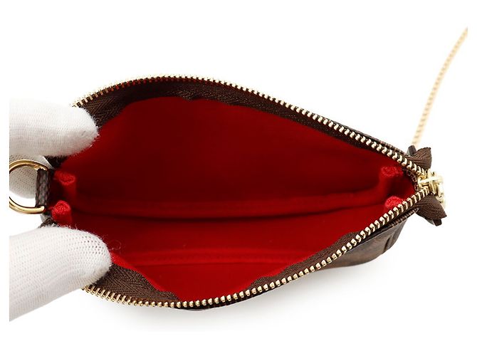 Louis Vuitton Damier Ebene Mini Pochette Accessoires Rosso - vista 5