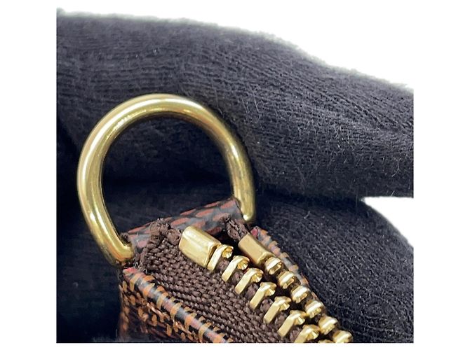 Louis Vuitton Damier Ebene Mini Pochette Accessoires Rosso - vista 7