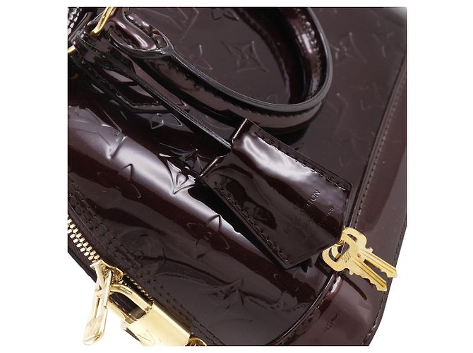 Louis Vuitton Alma BB in Monogram Vernis viola Porpora - vista 10