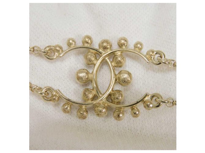 Pulsera Charm Chanel Negro Dorado Crudo - vista 4