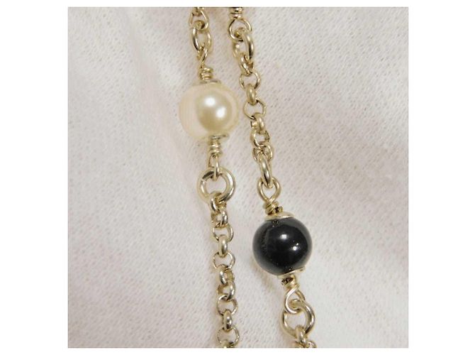 Pulsera Charm Chanel Negro Dorado Crudo - vista 5