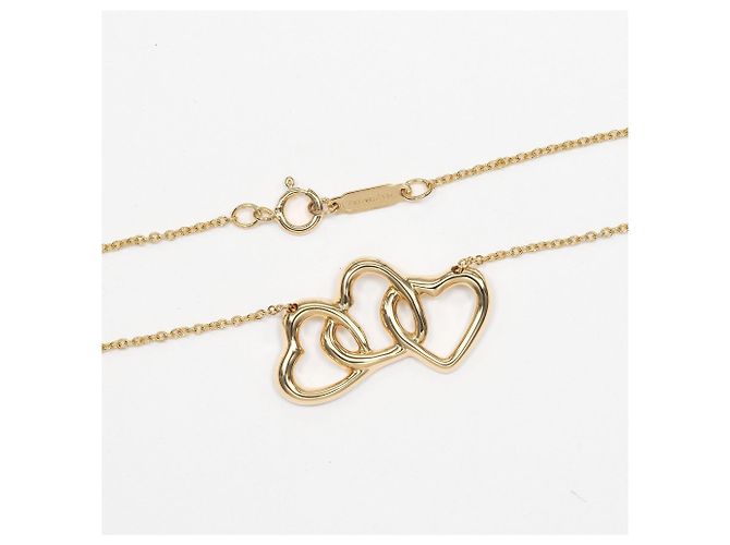 Tiffany & Co. Triple Heart Halskette aus 18K Gelbgold - Ansicht 6