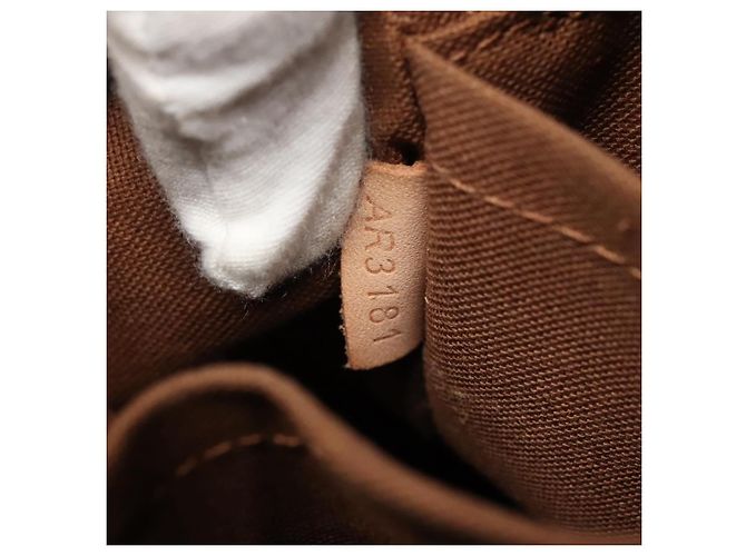 Louis Vuitton Trotteur Beaubourg Monogram Canvas Marrone - vista 7