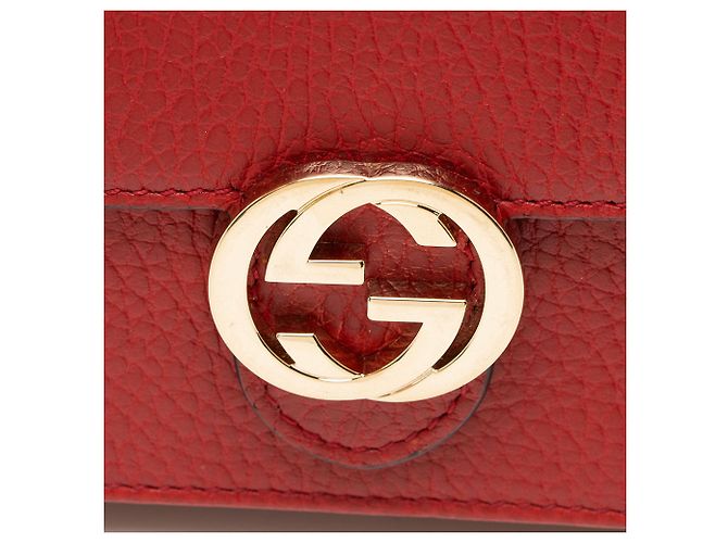 Cartera con cadena entrelazada G en piel de becerro granulada Gucci Roja - vista 9