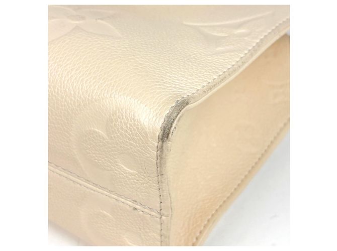 Borsa Louis Vuitton OnTheGo PM Crudo - vista 3