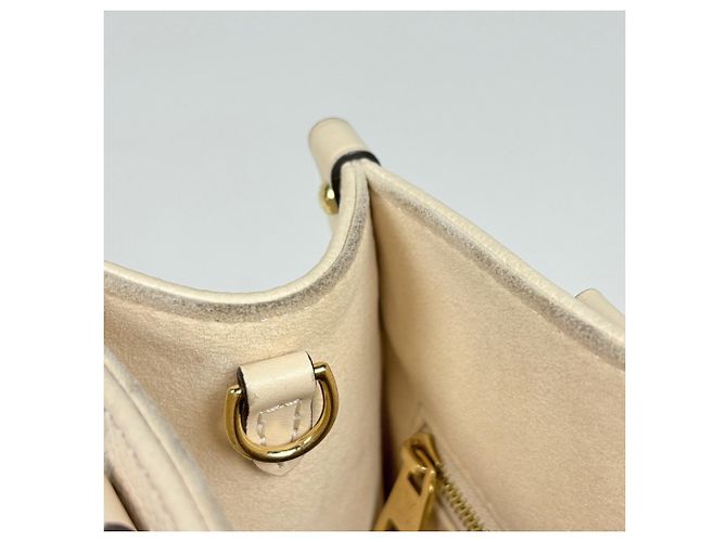 Borsa Louis Vuitton OnTheGo PM Crudo - vista 7