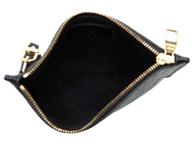 Pochette Loop in Monogram Empreinte nero di Louis Vuitton - vista 4