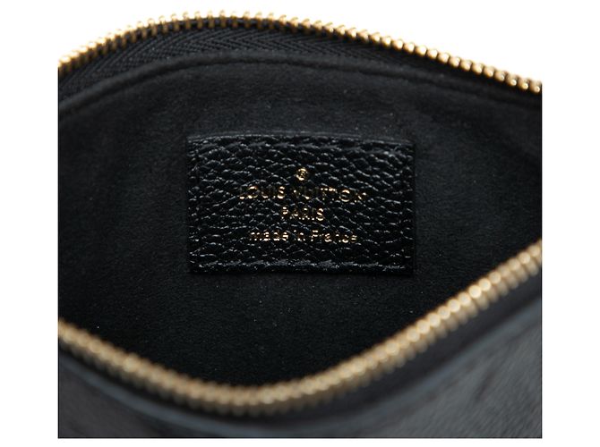 Pochette Loop in Monogram Empreinte nero di Louis Vuitton - vista 5
