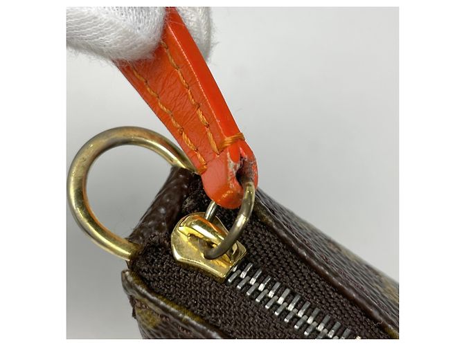 Bolsa Louis Vuitton Monogram Perfo Pochette Accessoires Laranja - vista 4