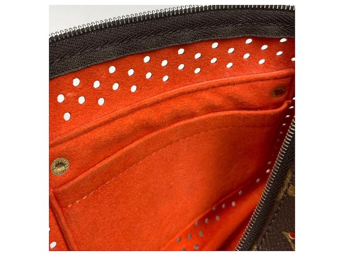 Bolsa Louis Vuitton Monogram Perfo Pochette Accessoires Laranja - vista 8