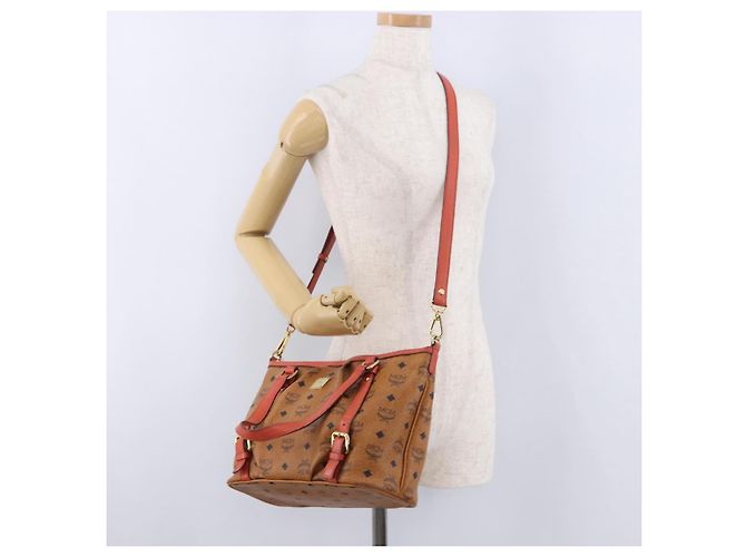 Bolsa Tote MCM Vicetos em PVC e couro marrom com detalhes dourados 2way Auth ki6729A - vista 24