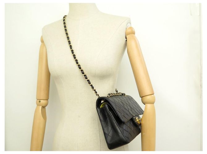 Timeless BOLSO CHANEL CLASSIC 11.12 MEDIUM A01112 CUERO MATELASSÉ NEGRO - vista 7