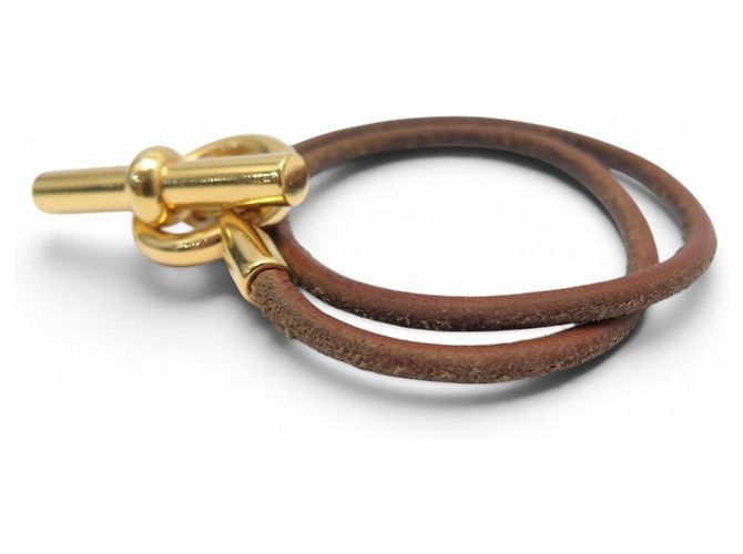 Hermès HERMES GLENAN HALSKETTE ARMREIF DOPPELWINDUNG GOLDFARBENES METALL UND LEDER Braun - Ansicht 2