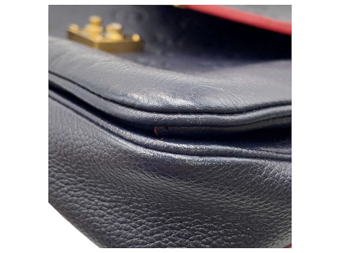 Borsa Louis Vuitton Monogram Empreinte Pochette Métis MM Rosso - vista 13
