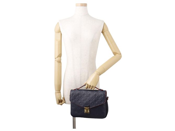 Borsa Louis Vuitton Monogram Empreinte Pochette Métis MM Rosso - vista 4