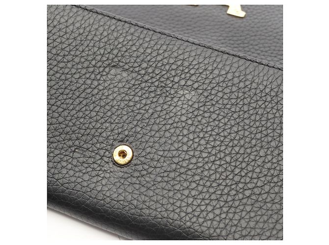 Portafoglio lungo pieghevole Louis Vuitton Portefeuille Capucines Nero - vista 7