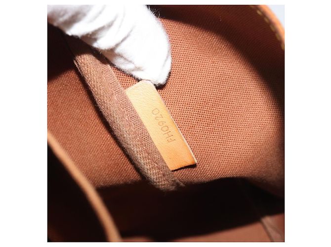 Louis Vuitton Saumur Monogram 35 Marrone - vista 6