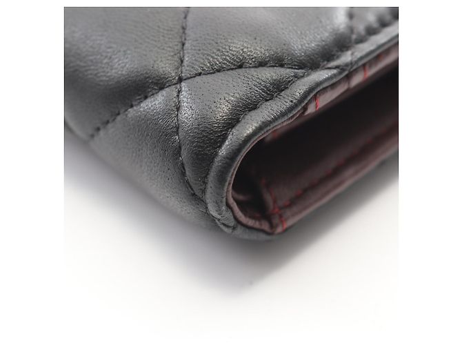 Chanel Matelassé Bi-fold Long Wallet aus schwarzem Lammleder - Ansicht 10