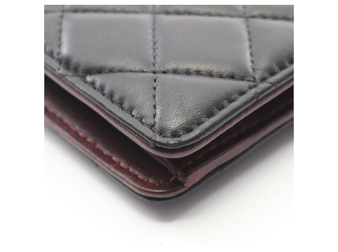 Chanel Matelassé Bi-fold Long Wallet aus schwarzem Lammleder - Ansicht 9
